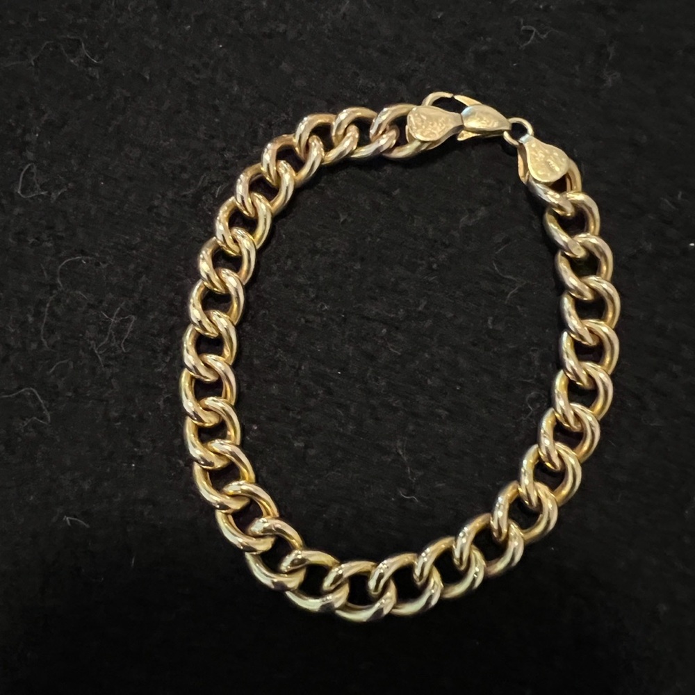 14k gold Cuban bracelet. Sold